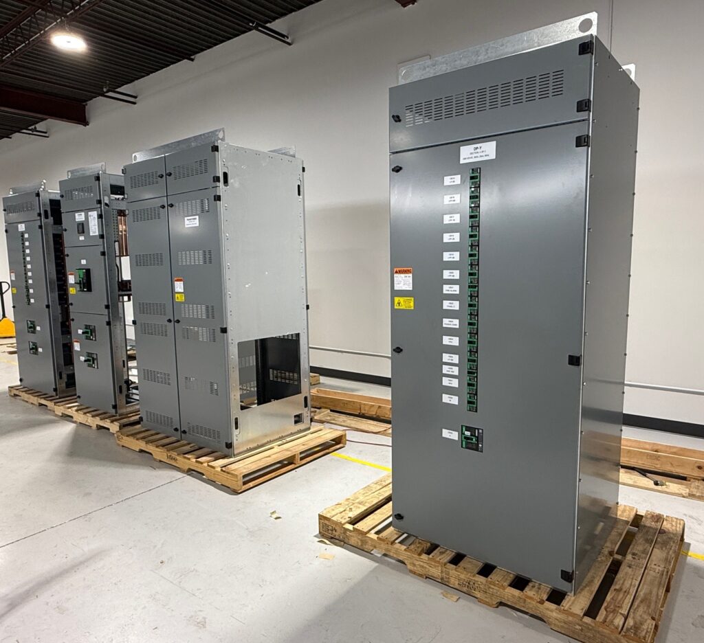 Custom low voltage switchgear panel by Exact Control Systems Inc: A UL 508A compliant system featuring structured busbar architecture, protective relays, and disciplined wiring for safe power distribution, isolation, and load protection in industrial environments.
