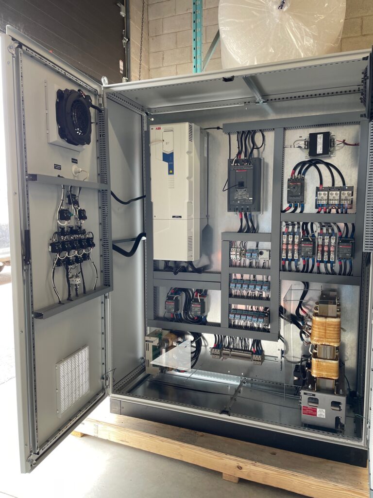 Custom pump station control panel by Exact Control Systems Inc: A UL 508A compliant system featuring automation, level monitoring, and disciplined wiring for reliable pump sequencing and high-availability water management.
