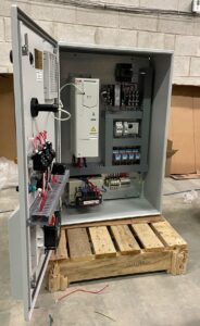 Custom-built HVAC automation panel by Exact Control Systems Inc: Redundant PLC architecture with integrated motor starters, VFD interfaces, and UL 508A compliant wiring layout.