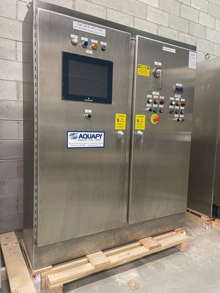 nterior of a custom NEMA 4 control panel by Exact Control Systems Inc, UL 508A compliant and weather-sealed for protection against dust, rain, and industrial washdown conditions, featuring PLC-driven automation, motor control components, and structured wiring engineered for reliable operation in harsh and corrosive environments.